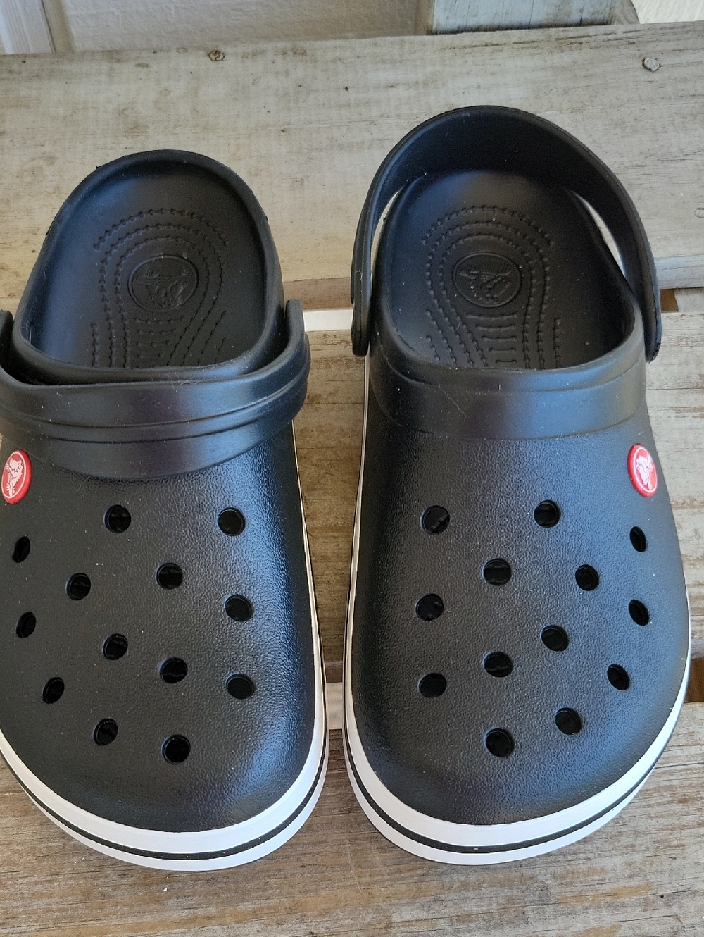CROCS  Black Clog with White Trim Size 9 Womans Size 7 Mens